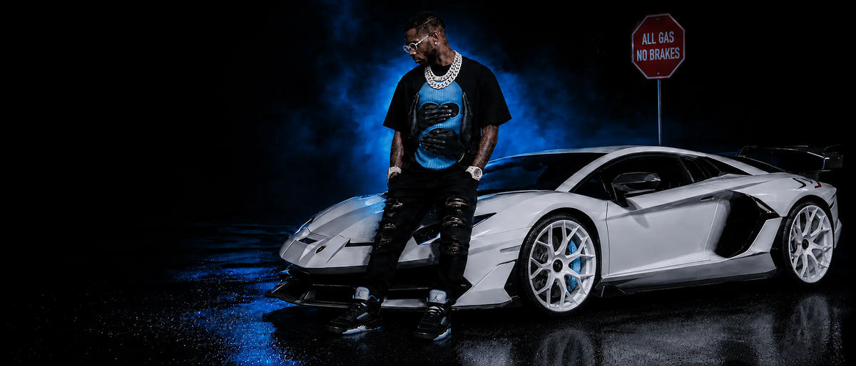 Rebranded Studios desktop hero with white Lamborghini, white rims and blue calipers