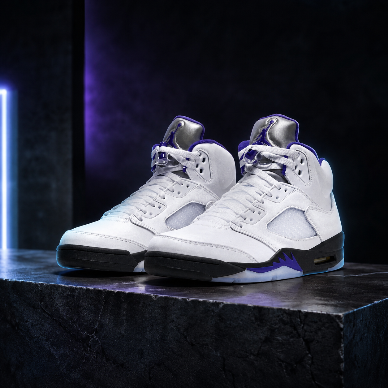 Air Jordan 5 Concord sneakers on a dark purple-lit campaign set