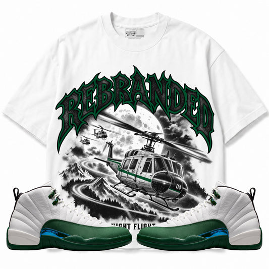Rebranded Studios Night Flight Air Jordan 12 Bucks Graphic T-Shirt — front with sneakers; bold REBRANDED, gray textured faces, clean collection-color stroke and black outline