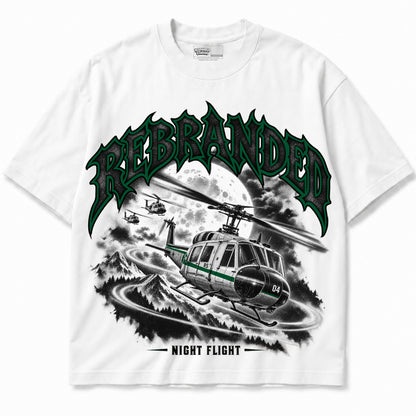 Rebranded Studios Night Flight Air Jordan 12 Bucks Graphic T-Shirt — garment front; bold REBRANDED, gray textured faces, clean collection-color stroke and black outline