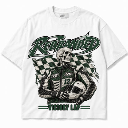 Rebranded Studios Victory Lap Air Jordan 12 Bucks Graphic T-Shirt — bold REBRANDED and VICTORY LAP; garment-front