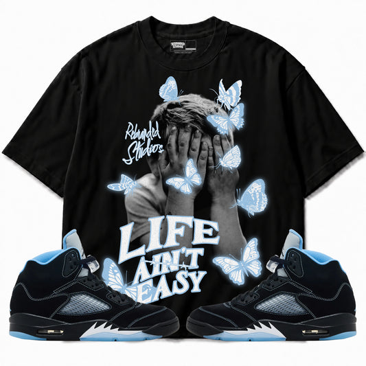 Rebranded Studios apparel — front styled with matching sneakers