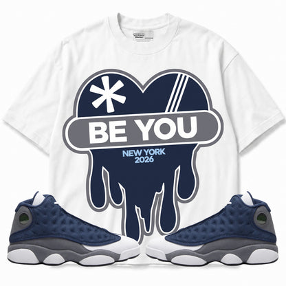 Rebranded Studios apparel — front styled with matching sneakers