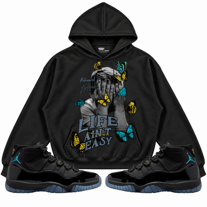 Rebranded Studios apparel — front styled with matching sneakers