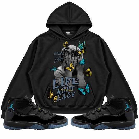 Rebranded Studios apparel — front styled with matching sneakers