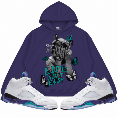 Rebranded Studios apparel — front styled with matching sneakers
