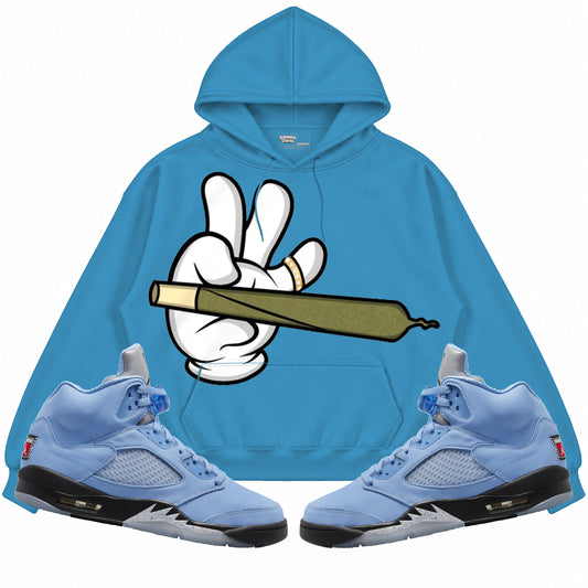 Rebranded Studios apparel — front styled with matching sneakers