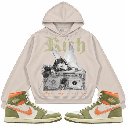 Rebranded Studios apparel — front styled with matching sneakers