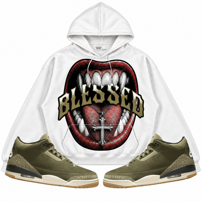 Rebranded Studios apparel — front styled with matching sneakers