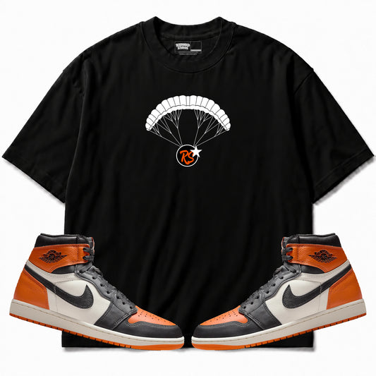 Rebranded Studios apparel — front styled with matching sneakers