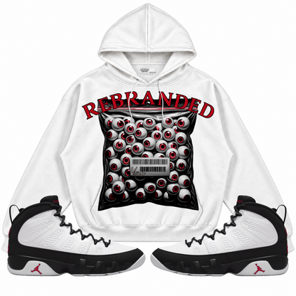 Rebranded Studios apparel — front styled with matching sneakers