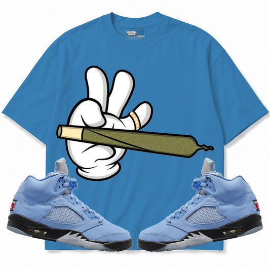 Rebranded Studios apparel — front styled with matching sneakers