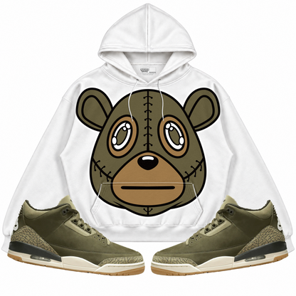 Rebranded Studios apparel — front styled with matching sneakers