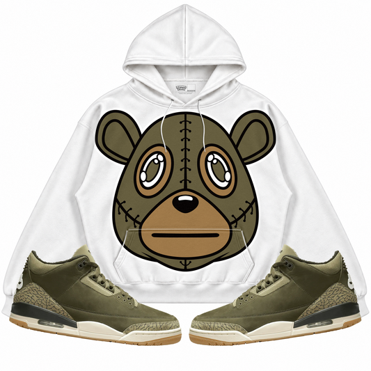 Rebranded Studios apparel — front styled with matching sneakers
