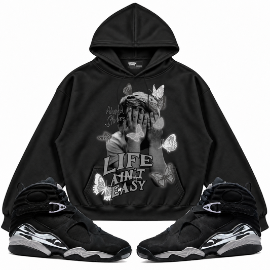Rebranded Studios apparel — front styled with matching sneakers