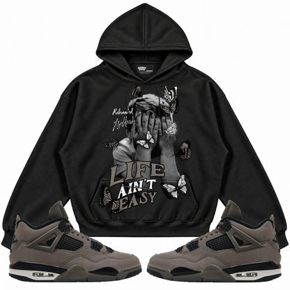 Rebranded Studios apparel — front styled with matching sneakers