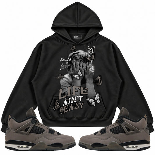 Rebranded Studios apparel — front styled with matching sneakers