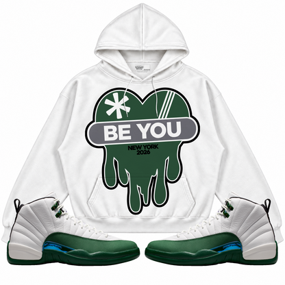 Rebranded Studios apparel — front styled with matching sneakers