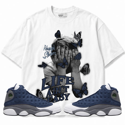 Rebranded Studios apparel — front styled with matching sneakers
