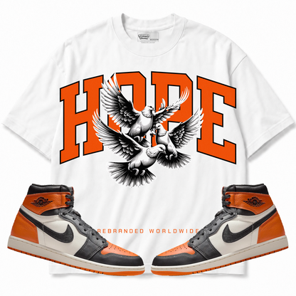 Rebranded Studios apparel — front styled with matching sneakers