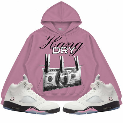 Rebranded Studios apparel — front styled with matching sneakers