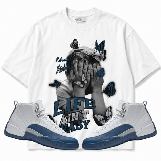 Rebranded Studios apparel — front styled with matching sneakers