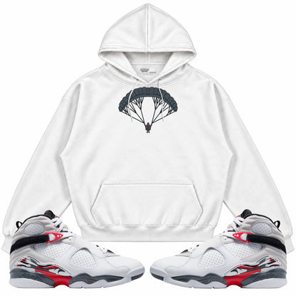 Rebranded Studios apparel — front styled with matching sneakers