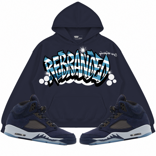 Rebranded Studios apparel — front styled with matching sneakers