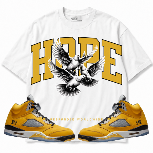 Rebranded Studios apparel — front styled with matching sneakers