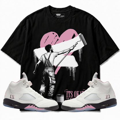 Rebranded Studios apparel — front styled with matching sneakers