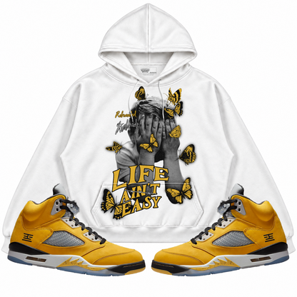 Rebranded Studios apparel — front styled with matching sneakers