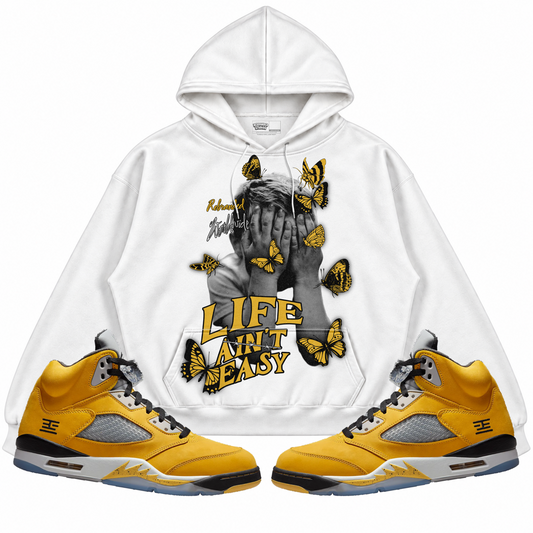 Rebranded Studios apparel — front styled with matching sneakers