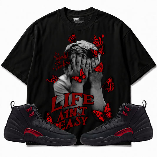 Rebranded Studios apparel — front styled with matching sneakers