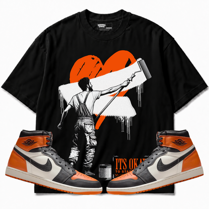 Rebranded Studios apparel — front styled with matching sneakers