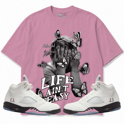 Rebranded Studios apparel — front styled with matching sneakers