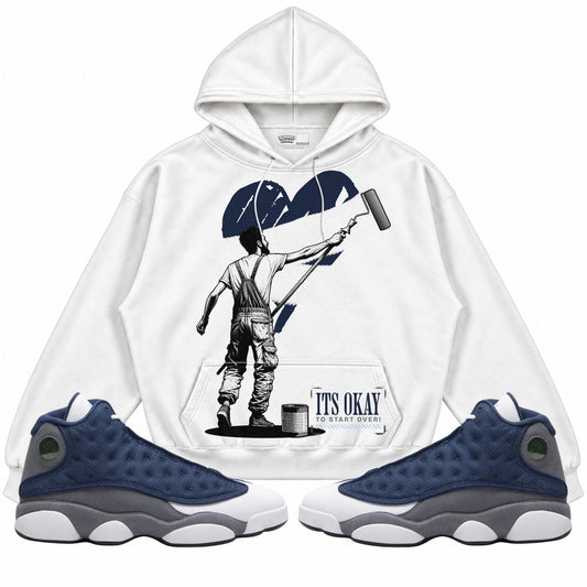 Rebranded Studios apparel — front styled with matching sneakers