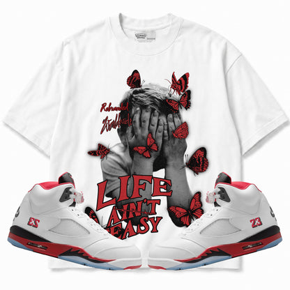 Rebranded Studios apparel — front styled with matching sneakers