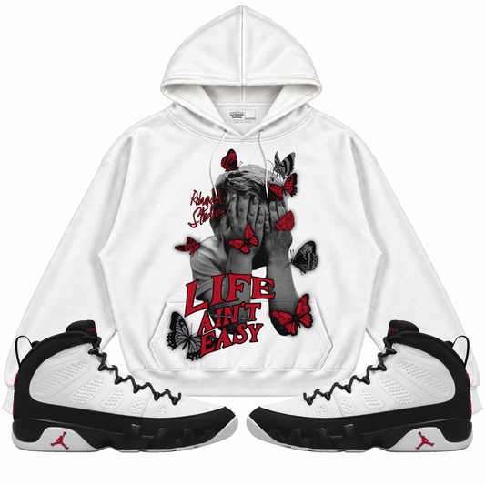 Rebranded Studios apparel — front styled with matching sneakers