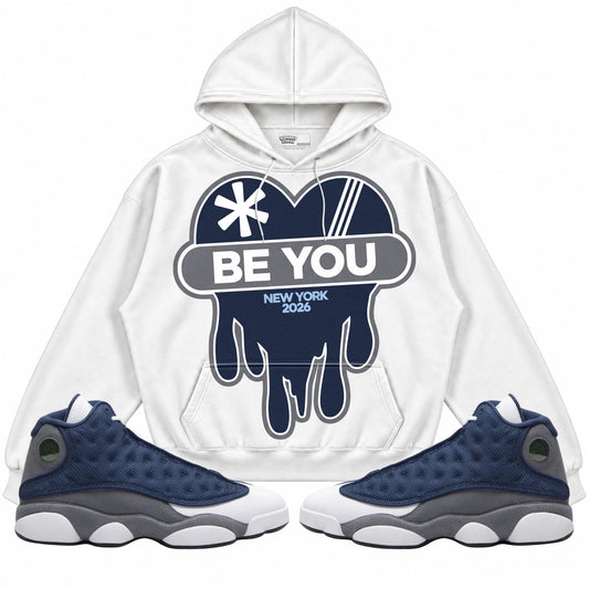 Rebranded Studios apparel — front styled with matching sneakers