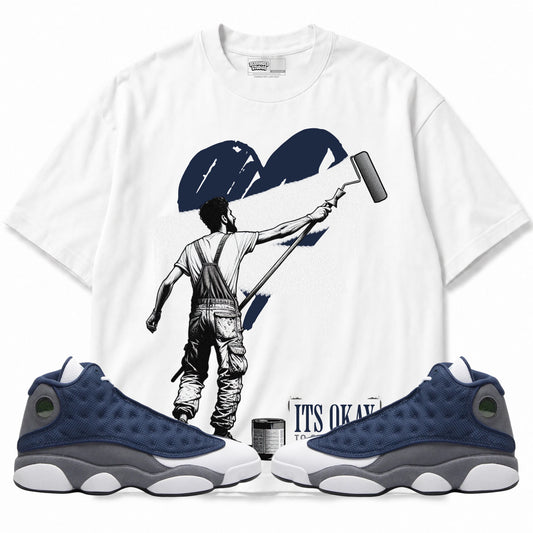 Rebranded Studios apparel — front styled with matching sneakers