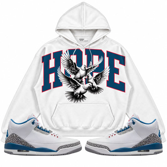 Rebranded Studios apparel — front styled with matching sneakers