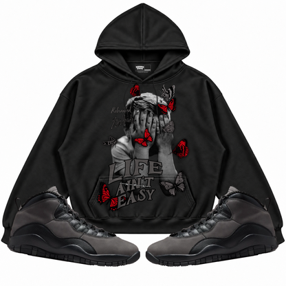 Rebranded Studios apparel — front styled with matching sneakers