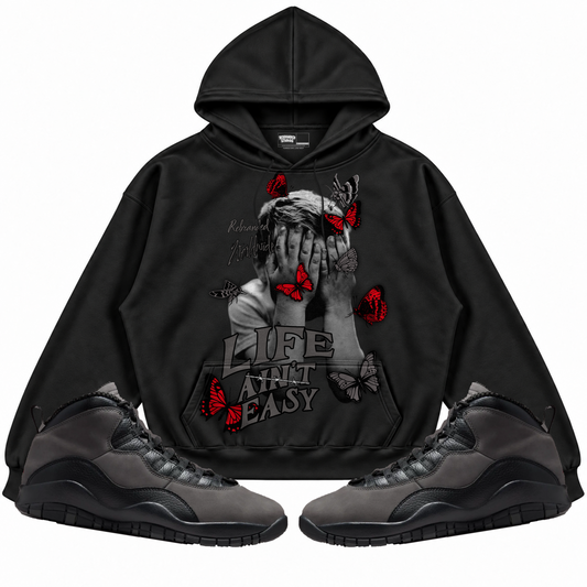 Rebranded Studios apparel — front styled with matching sneakers