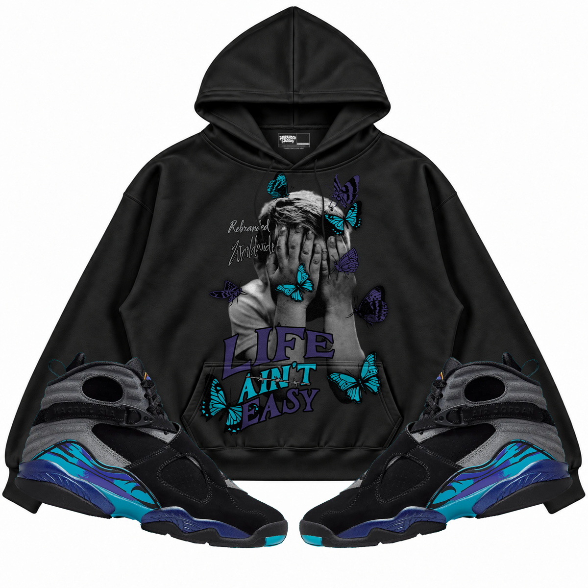 Rebranded Studios apparel — front styled with matching sneakers