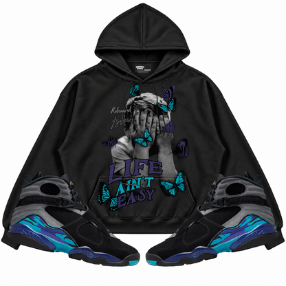 Rebranded Studios apparel — front styled with matching sneakers