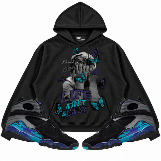 Rebranded Studios apparel — front styled with matching sneakers
