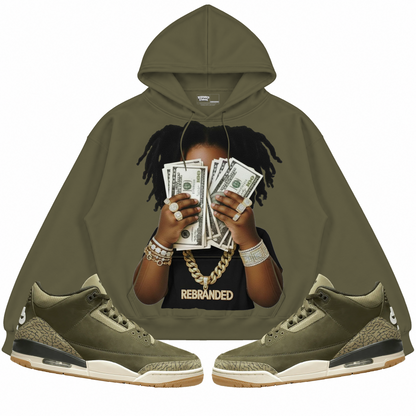 Rebranded Studios apparel — front styled with matching sneakers
