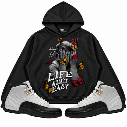 Rebranded Studios apparel — front styled with matching sneakers