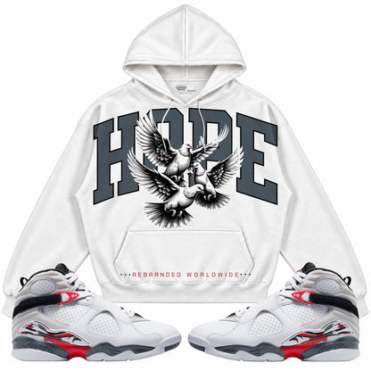 Rebranded Studios apparel — front styled with matching sneakers