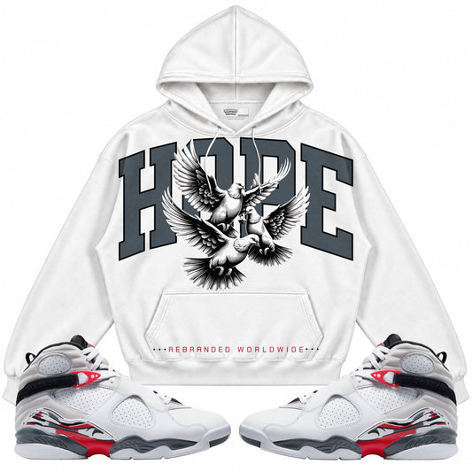 Rebranded Studios apparel — front styled with matching sneakers